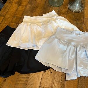 Aerie Real Me Crossover Flowy Shorts.Stylish Black, White, and Light Blue Skorts